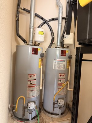 Water heater install. - Changed out these two 50 gallon water heaters and installed a new 80 gallon water heater. Water heater install. - Changed out these two 50 gallon water heaters and installed a new 80 gallon water heater.