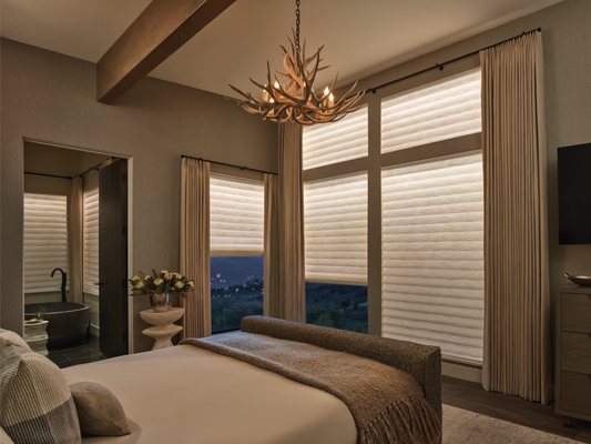 Aura Illuminated Shades - Aura Illuminated Shades are a Hunter Douglas product that combines a light-filtering fabric shade, a room-darkening liner, and integrated LED strip lighting to create a customizable, glowing ambiance. This innovative window treatment allows for a soft, natural light display day or night, simulating the effect of a translucent window covering while also providing privacy and light control. You can adjust the light's brightness and color temperature to create a desired mood, wake up gently, or simply add warmth to a room.