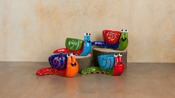 Make your own Snail Planter - BigKid, aka Kiln Wizard, aka Queen of Clay and Glass, will guide you through the making of an adorable and completely functional snail-shaped planter. Spend a relaxing and entertaining evening of clay hand-building with the Clay Cottage staff. Advanced tickets are required, and seating is limited. Outside food and drink are allowed, so BYOB. Call for details. Make your own Snail Planter - BigKid, aka Kiln Wizard, aka Queen of Clay and Glass, will guide you through the making of an adorable and completely functional snail-shaped planter. Spend a relaxing and entertaining evening of clay hand-building with the Clay Cottage staff. Advanced tickets are required, and seating is limited. Outside food and drink are allowed, so BYOB. Call for details.