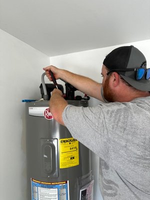 Water Heater Maintenance - Tank style / conventional water heaters require annual maintenance and inspection. 

The sacrificial anode rod located inside the tank of the water heater is there to protect the inner liner of the water heater. 

The rod deteriorates from the harmful chemicals / contaminants in the water supply. 

Once the rod is diminished the tank becomes susceptible to those harmful chemicals and contaminants. 

Keeping a good anode rod inside the water heater can help prolong the life of the water heater. 

One way to also help prolong the life of the water heater and the anode rod is to install water filtration systems in the water service to your home. 

This will remove those harmful contaminants not only hurting the water heater but also harming you as well.
