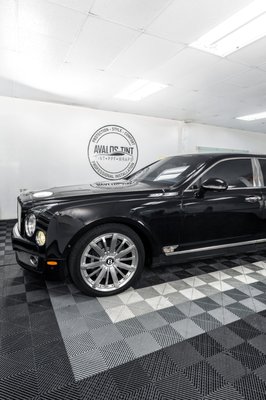 Bentley Interior Protection - Living in Las Vegas, we drivers face a big problem.
The sun and extreme heat ruin the inside of our cars. The beautiful leather seats and elegant wooden trim are at risk of fading and cracking.
This customer loved his car and wanted to keep it looking great. This is why we install XPEL tints, made to protect car interiors from the sun's damaging rays and reduce heat. For this customer, this meant his leather seats stayed soft and the wood didn't crack or lose its shine.
After getting XPEL tint, this customer noticed a big change. His car was cooler and more comfortable. He was relieved and happy, knowing his car was safe from the harsh Vegas sun.
You can protect your car’s interior and make your drives more comfortable. XPEL Window Tint XR Plus is your answer to the intense Vegas sun.
For over 25 years, we've been making cars in Vegas Valley cooler with our window tinting. Our experience means we know just what your car needs to beat the Vegas heat. Ready for a cooler ride? Contact us and let's get started on your car! Bentley Interior Protection - Living in Las Vegas, we drivers face a big problem.
The sun and extreme heat ruin the inside of our cars. The beautiful leather seats and elegant wooden trim are at risk of fading and cracking.
This customer loved his car and wanted to keep it looking great. This is why we install XPEL tints, made to protect car interiors from the sun's damaging rays and reduce heat. For this customer, this meant his leather seats stayed soft and the wood didn't crack or lose its shine.
After getting XPEL tint, this customer noticed a big change. His car was cooler and more comfortable. He was relieved and happy, knowing his car was safe from the harsh Vegas sun.
You can protect your car’s interior and make your drives more comfortable. XPEL Window Tint XR Plus is your answer to the intense Vegas sun.
For over 25 years, we've been making cars in Vegas Valley cooler with our window tinting. Our experience means we know just what your car needs to beat the Vegas heat. Ready for a cooler ride? Contact us and let's get started on your car!