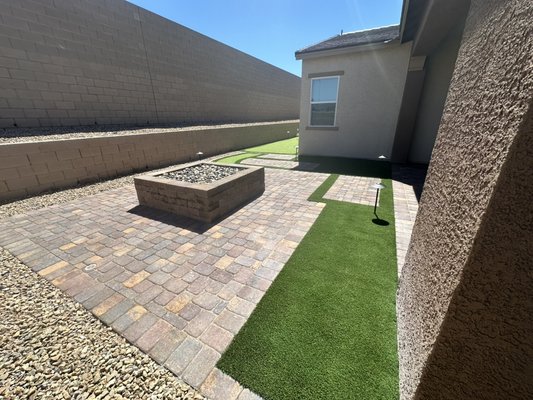 Backyard putting green and fire pit - New build backyard in cadence Henderson, Nevada. Call us today. 702-955-6311 free in person consultations, digital renderings and designs HOA approval financing available. Backyard putting green and fire pit - New build backyard in cadence Henderson, Nevada. Call us today. 702-955-6311 free in person consultations, digital renderings and designs HOA approval financing available.