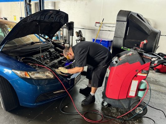 A/C Service and Repair - A/C Service and Repair: A vehicle’s HVAC (heating, ventilation, air conditioning) system, has become more complex and efficient in newer model cars. Here at Keep It New Auto Service, in Brentwood, CA, we service almost all aspects of your auto's HVAC system.
Your engine coolant is for cooling the engine (antifreeze), but it also transports that heat into a box (heater core box, that is usually in your dash). That way, the engine’s hot air can provide you with warmth on those frosty days. But this has nothing to do with your air conditioning that is located in the same area but is almost always a completely separate system. It does, however, typically share the fan and air ducts. So, if coolant is low, being that it’s a separate system then your air conditioning, simply addressing that, will have no impact on your A/C.
There are so many aspects of an HVAC system that we could write about. Instead of boring you with details, come on in and leave it up to our ASE Certified Technicians to diagnose your vehicle and its body control modules, compressors, expansion valves or orifice tubes, or even the receiver dryers along with all the electronics, that make it all work and keep you comfortable on the road. A/C Service and Repair - A/C Service and Repair: A vehicle’s HVAC (heating, ventilation, air conditioning) system, has become more complex and efficient in newer model cars. Here at Keep It New Auto Service, in Brentwood, CA, we service almost all aspects of your auto's HVAC system.
Your engine coolant is for cooling the engine (antifreeze), but it also transports that heat into a box (heater core box, that is usually in your dash). That way, the engine’s hot air can provide you with warmth on those frosty days. But this has nothing to do with your air conditioning that is located in the same area but is almost always a completely separate system. It does, however, typically share the fan and air ducts. So, if coolant is low, being that it’s a separate system then your air conditioning, simply addressing that, will have no impact on your A/C.
There are so many aspects of an HVAC system that we could write about. Instead of boring you with details, come on in and leave it up to our ASE Certified Technicians to diagnose your vehicle and its body control modules, compressors, expansion valves or orifice tubes, or even the receiver dryers along with all the electronics, that make it all work and keep you comfortable on the road.