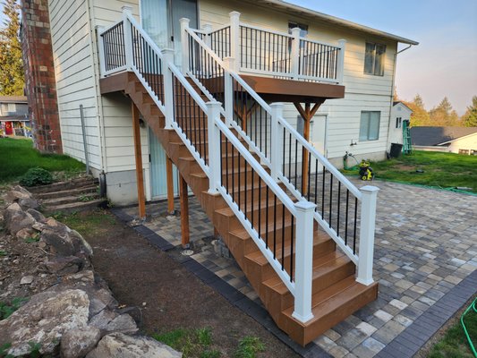 Second Story Deck | Lake Stevens, WA - Gorgeous brand new second story deck with a staircase build with Trex Composite Decking and Railings. Second Story Deck | Lake Stevens, WA - Gorgeous brand new second story deck with a staircase build with Trex Composite Decking and Railings.