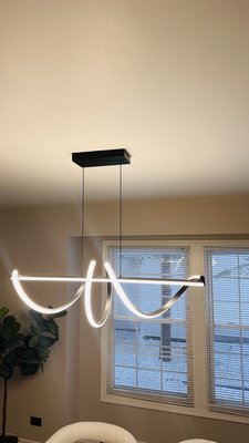 LED fixture installation - This project involved replacing an outdated chandelier with a modern, energy-efficient lighting fixture to brighten and update the dining area. We safely removed the old fixture, upgraded the wiring as needed, and installed the new contemporary light to transform the space. The result is a cleaner, modern look with improved light distribution. Another quality installation by WattUp Electric — licensed, bonded, and insured.