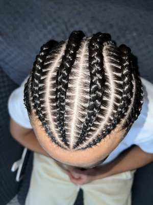 Stitch Braids - Stitch Braids are a popular choice for men, giving a clean and polished look for any occasion. Choose from any number braids and designs, and feel free to request a design you’ve seen on social media!
