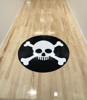 Nissan North America Headquarters -Franklin, TN - Ideal Hardwood Floors completed this custom hardwood flooring project at Nissan’s North American headquarters in Franklin, Tennessee. The elevator foyer features 2¼-inch and ¾-inch maple hardwood flooring, finished with Bona Traffic for durability and a natural appearance. A custom hand-painted art medallion adds a distinctive design element, showcasing the attention to detail and quality craftsmanship.