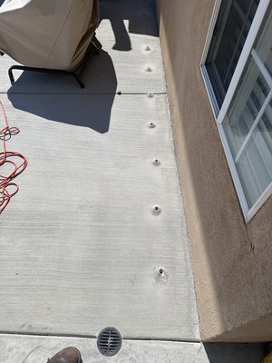 Subterranean Termite Treatment - This is a subterranean termite treatment. Since these termites live in the soil , we must treat the soil to eradicate the infestation. We drill past the concrete slab and inject termiticide into the soil. This infects the termites as they make their way up from the soil.