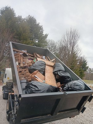 Construction Debris Removal - This dumpster was dropped off at a customers house while they were doing a house removation project. It is a 15 yard dumpster and they filled it with all of the construstion debris. Construction Debris Removal - This dumpster was dropped off at a customers house while they were doing a house removation project. It is a 15 yard dumpster and they filled it with all of the construstion debris.