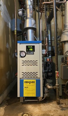 Replacement Gas-fired Hot Water Boiler - We replaced this customer's defective Gas-fired Hot Water Boiler because upon ignition, the flames were rolling out of the boiler's Burner Tubes. And also because the cast-iron vessel was leaking as well. 
The customer chose to go with one of our cost-effective Boiler Manufacturer options, and we replaced all of the viral components. As you can see from the photographs, the replacement boiler's profile fit perfectly in the space. And needless to say both the customer and I were very happy with the results. Moreover, we had this replacement Boiler installed in a timely manner and got the customer's Heating up and running the same day. 
Call Urban Mechanical today at (201)-687-1074 for all of your Heating maintenance needs & Boiler replacement quotes.