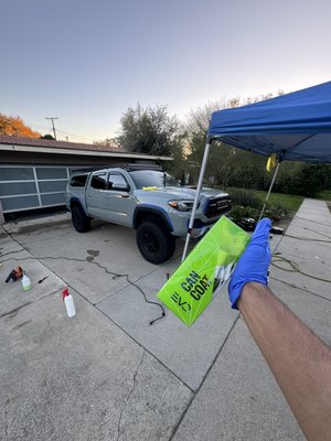 Paint Enhancement & Ceramic Coating - This 2021 Tacoma came in needing more than just a wash and left looking better than ever. We performed a one-step polish and clay bar treatment to restore gloss, remove contamination, and bring the paint back to life. To protect the finish, we topped it with a 1-year ceramic coating, making it easier to wash and keeping it protected for the long run.

The engine bay was safely detailed, bringing it back to a clean, factory-fresh look. Inside, the truck received a mini interior detail to refresh surfaces, remove buildup, and create a clean, comfortable cabin.

The result?
Deep shine. Smooth paint. Long-lasting protection. A truck that turns heads and stays cleaner longer.

If your vehicle needs more than a quick wash and you want real, professional results, I’m here to help.
Message me with your year and model and I’ll guide you to the right service for your vehicle.