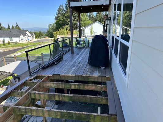 1,064 sq’ composite deck! - This deck build was such a fun and exciting experience for our clients. They had been living with an old rotted wood deck for years and couldn’t enjoy it. Through many consultations we came up with a great design and came in under budget.