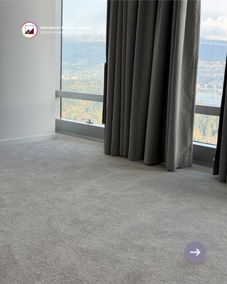 PJ#004522 - Paradox Hotel Vancouver - Carpet running smooth through the primary bedroom into the walk-in closet, then a crisp line where it meets tile in the hall. No ripples, no gaps — just the kind of detail you only notice when it's done nice and right.