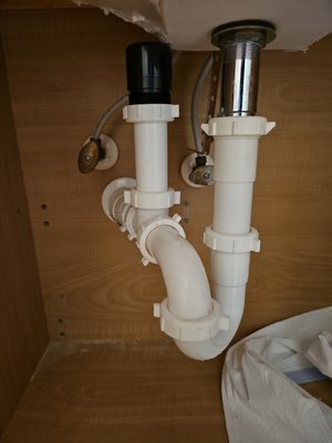 Air admittance valve install - Installation of an AAV aids in venting the fixture, keeping sewer gas down and providing the 14.7 lbs of atmospheric pressure required to ac Air admittance valve install - Installation of an AAV aids in venting the fixture, keeping sewer gas down and providing the 14.7 lbs of atmospheric pressure required to ac
