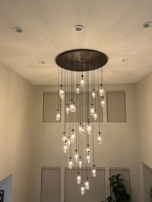 Crystal Chandelier Installation 2025 - We recently installed a 60-inch crystal chandelier weighing 225 lbs on a 24-foot ceiling for a residential client.

✅ Removed the old fixture
✅ Installed and secured the new chandelier
✅ Wired and balanced 31 individual lights
✅ Total installation time: 13 hours

This was a challenging high-ceiling project that required precision, proper equipment, and attention to safety.

We handle everything from lighting upgrades to panel replacements and EV charger installations.