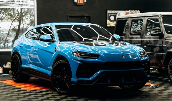 Vinyl Wrapping for Lamborghini Urus - Lamborghini Urus wrapped in Gloss Blue Vinyl Wrap by our team. Vinyl Wrapping for Lamborghini Urus - Lamborghini Urus wrapped in Gloss Blue Vinyl Wrap by our team.