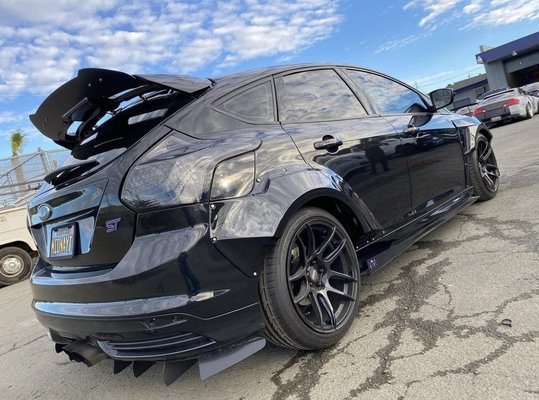 Ford Focus ST Widebody Fabrication, Paint Matched & Installed - A customer came in with a Widebody kit ordered from Russia. 
We went ahead and did our fabrications, Painted & Installed on this immaculate Ford Focus ST. Thank you for your business.