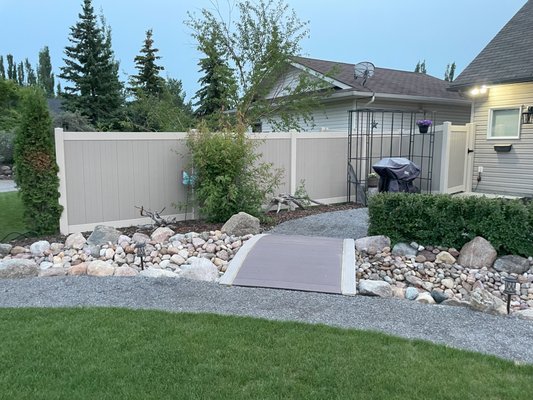 Multi Color Vinyl Fence - This was a smaller scope project to finish enclosing a yard. The homeowners chose a two tone vinyl fence, and the results we great! Give us a call and get your project started today! Multi Color Vinyl Fence - This was a smaller scope project to finish enclosing a yard. The homeowners chose a two tone vinyl fence, and the results we great! Give us a call and get your project started today!