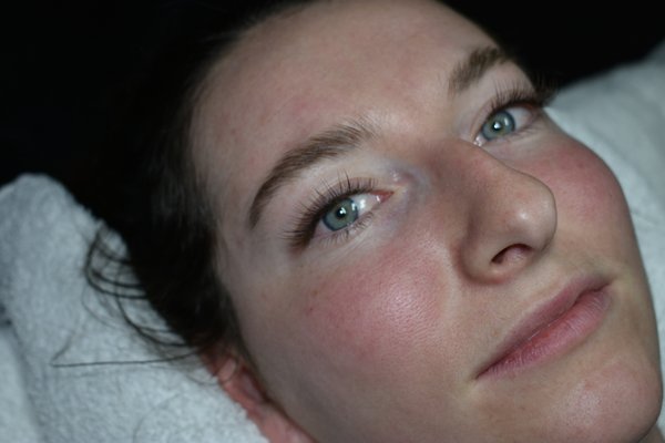 Natural Looking Hybrid Volume Lash Extensions - This is an example of a very natural looking hybrid volume full set of lash extensions. Lash extensions can be customized to your unique features and taste thanks to a variety of lengths, curl strengths, colors, and diameters available. The style and overall shape of your set will be determined after a brief consultation with your lash artist. This client wanted more than what a lash lift could give her, but still wanted her lashes to look natural while eliminating her need for mascara or eyeliner. Natural Looking Hybrid Volume Lash Extensions - This is an example of a very natural looking hybrid volume full set of lash extensions. Lash extensions can be customized to your unique features and taste thanks to a variety of lengths, curl strengths, colors, and diameters available. The style and overall shape of your set will be determined after a brief consultation with your lash artist. This client wanted more than what a lash lift could give her, but still wanted her lashes to look natural while eliminating her need for mascara or eyeliner.