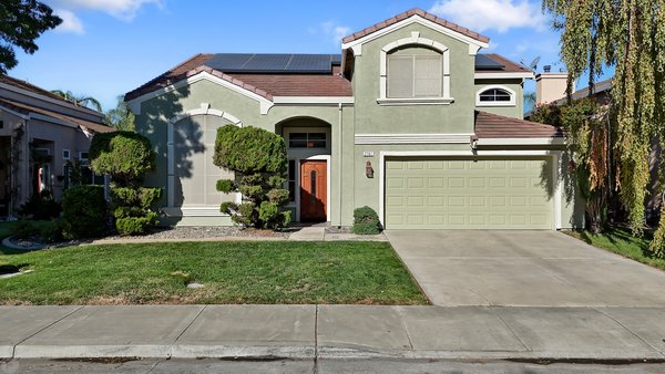 2161 David Ernest Ct Tracy CA - Beautiful east-facing Sterling Estates home with a pool & solar, newly painted exterior, new carpet & pad, newer WH, 5 bedrooms + loft, 1 BR downstairs, solar system is 9.43 kw with 24 panels, solar lease is $185/mo, kitchen features slab granite counters, full backsplash, island, new gas stove, Bosch dishwasher, stainless fridge stays & tile flooring, breakfast nook has extended cabinetry with glass doors & slider to backyard, family room has tile-face fireplace and lighted C/F, master includes 2 sinks, tub, stall shower, walk-in closet & tile floor, upstairs hall bath has 2 sinks, newer light & sink faucets, laundry room has electric dryer hookup, W&D stay and cabinetry, finished & painted garage with opener, sink, workbench & attic storage with pull-down ladder, backyard features a newly plastered inground Gunite pool, newer variable speed pump, colored salt-finish decking, fruit trees and rosebushes. Close to shopping, restaurants & conveniences. Come take a look! 2161 David Ernest Ct Tracy CA - Beautiful east-facing Sterling Estates home with a pool & solar, newly painted exterior, new carpet & pad, newer WH, 5 bedrooms + loft, 1 BR downstairs, solar system is 9.43 kw with 24 panels, solar lease is $185/mo, kitchen features slab granite counters, full backsplash, island, new gas stove, Bosch dishwasher, stainless fridge stays & tile flooring, breakfast nook has extended cabinetry with glass doors & slider to backyard, family room has tile-face fireplace and lighted C/F, master includes 2 sinks, tub, stall shower, walk-in closet & tile floor, upstairs hall bath has 2 sinks, newer light & sink faucets, laundry room has electric dryer hookup, W&D stay and cabinetry, finished & painted garage with opener, sink, workbench & attic storage with pull-down ladder, backyard features a newly plastered inground Gunite pool, newer variable speed pump, colored salt-finish decking, fruit trees and rosebushes. Close to shopping, restaurants & conveniences. Come take a look!