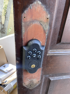 Lock Changing - This Keypad was installed on an old door with a different type of lock. Customer wants keyless system and he is really happy with the results.