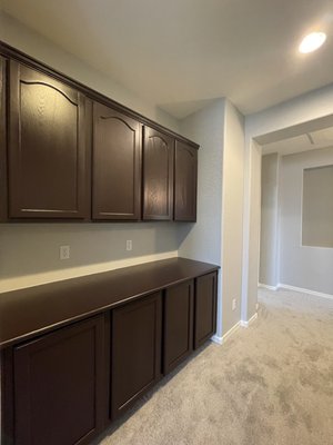 A lot of Wood - This client is selling his home in a high-value market. He required us to paint all his wood in his home. This included the cabinets and stair rails. Let us know what you think.