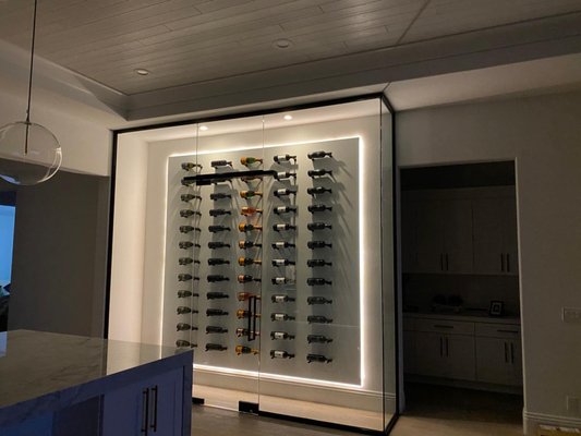 Wine wall - Upgraded kitchen cabinet wall to a wine wall. Wine wall - Upgraded kitchen cabinet wall to a wine wall.