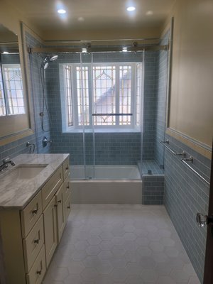 Glendale Tub Bathroom Upstairs - 2026 - The Glendale New Tub/Shower Bathroom Upstairs, was completed by Popular Bathroom professionals with new tub, new shower head 81" from the ground, new hand shower, new tub faucet, and tub drain. new tub/shower wall tiles up to the ceiling. new seating bench, strong, safe, and secure shower glass doors with towel bar. Bathroom wall paint with two towel bars, new single vanity with mirror, and new toilet. New bathroom floor tiles with new ceiling lights.
See more pictures on Yelp.com and call Popular Bathroom at (818) 267-8568 for your free consultation and estimate by the Owner, Abraham Samara. Glendale Tub Bathroom Upstairs - 2026 - The Glendale New Tub/Shower Bathroom Upstairs, was completed by Popular Bathroom professionals with new tub, new shower head 81" from the ground, new hand shower, new tub faucet, and tub drain. new tub/shower wall tiles up to the ceiling. new seating bench, strong, safe, and secure shower glass doors with towel bar. Bathroom wall paint with two towel bars, new single vanity with mirror, and new toilet. New bathroom floor tiles with new ceiling lights.
See more pictures on Yelp.com and call Popular Bathroom at (818) 267-8568 for your free consultation and estimate by the Owner, Abraham Samara.