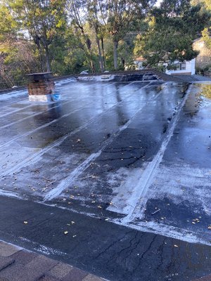 Roof replacement - Roof replacement of a flat roof and shingles