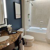 Bathroom Remodel - This Bathroom was a remodel. We remodeled the tub, toilet, sinks and made it look fresh and new for the home owner.