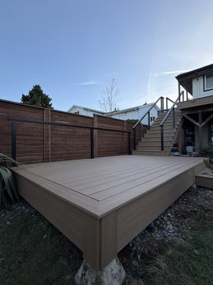 Composite Deck with Cable Railing - Full composite deck build with picture frame detail, premium cable railing, and custom stairs. Designed for a clean modern look with low maintenance and long-term durability.