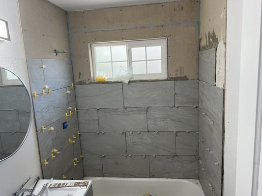 Kitchen and bathroom tile job - I was hired to come in and repair previous tile work someone else had stared but was not doing to well at. I came on and finished and repaired the tile work Kitchen and bathroom tile job - I was hired to come in and repair previous tile work someone else had stared but was not doing to well at. I came on and finished and repaired the tile work