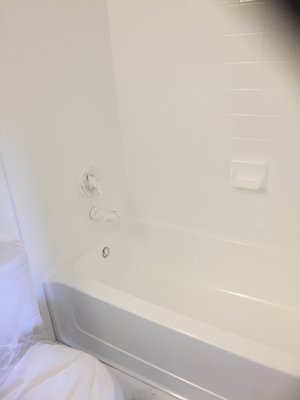 Tub & tile surround - We use a 4 step process which consists of acid etching, re-grouting tile walls, epoxy primer for superior adhesion, and apply 3 coats of Acrylic urethane for the top coat. This all makes for a quality job that will last for many years to come. Tub & tile surround - We use a 4 step process which consists of acid etching, re-grouting tile walls, epoxy primer for superior adhesion, and apply 3 coats of Acrylic urethane for the top coat. This all makes for a quality job that will last for many years to come.