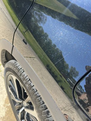 2023 Toyota Highlander scratches removal plus wash - Small exterior wash with minor scratches removal