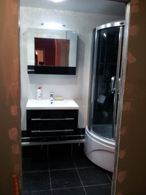 Bathroom Installation - Installation of the shower tab and ceramic tiles.