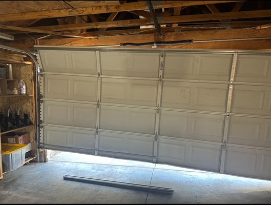 garage door off track re install cable and wheel - The cable and wheel came off the tracks on this garage door but we were able to put it back on and had door up and running like nothing ever happened. garage door off track re install cable and wheel - The cable and wheel came off the tracks on this garage door but we were able to put it back on and had door up and running like nothing ever happened.