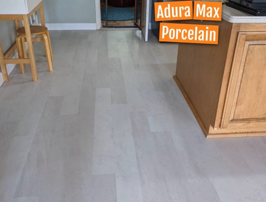 Porcelain LVT - This home had a concrete slab addition that had settled over time, creating a crack that went clear across the room and broke the tiles. We worked on leveling and then put click plank across the crack direction. The floating plank will be flexible should the house settle a bit more. Porcelain LVT - This home had a concrete slab addition that had settled over time, creating a crack that went clear across the room and broke the tiles. We worked on leveling and then put click plank across the crack direction. The floating plank will be flexible should the house settle a bit more.