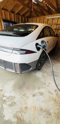 Electric Vehicle Charging Station - Scope of Work
Excavated approximately 40 feet of trench from the main electrical panel area to the detached garage.
Installed underground exterior-rated conduit in the trench.
Pulled and installed new electrical wiring suitable for Level 2 EV charger load.
Installed a new circuit breaker in the main electrical panel.
Mounted and installed a Level 2 Electric Vehicle (EV) charger in the garage.
Performed system testing: verified voltage, continuity, and proper grounding.
Customer tested the system — charging successfully overnight.
Compared charging performance:
New Level 2 charger: Charges vehicle overnight (significant improvement).
Old 110V (Level 1) outlet: Previously required over a week for full charge.