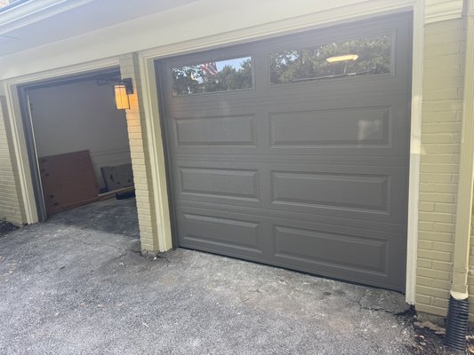 Two 8x7 full replacement doors - Replacement of old worn out doors with nice new Delden Dv-400 insulated with top row glass.