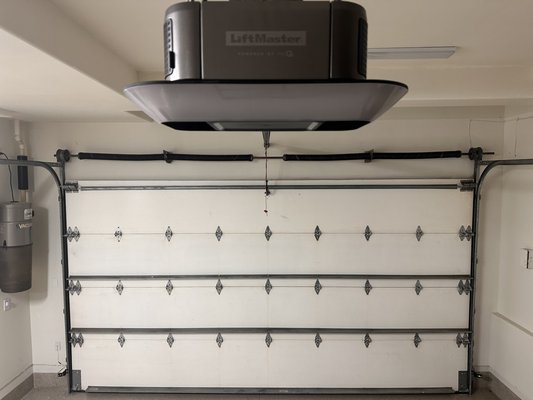 Smart Garage Opener Upgrade - A garage door opener should do more than open and close your garage—it should make your home quieter, safer, and more convenient every day. At The Garagers, we install premium smart garage door openers that deliver whisper-quiet performance, dependable operation, and modern smart-home connectivity.
Whether you're replacing an aging opener, upgrading to Wi-Fi and smartphone control, or installing a new opener with battery backup and enhanced security features, we help you choose the right system for your home and lifestyle.
Every installation is completed with meticulous attention to detail, including proper door balancing, force and travel adjustments, safety sensor testing, remote programming, keypad setup, and full system inspection to ensure years of reliable performance.
Our goal is simple: deliver a quieter garage, smoother operation, and the premium experience your home deserves.
Our opener upgrade services include:
• Smart Wi-Fi enabled garage door openers
• Whisper-quiet belt drive systems
• Battery backup installation
• Wireless keypad & remote programming
• Smartphone app setup
• Safety inspection & testing
• Professional installation & calibration Smart Garage Opener Upgrade - A garage door opener should do more than open and close your garage—it should make your home quieter, safer, and more convenient every day. At The Garagers, we install premium smart garage door openers that deliver whisper-quiet performance, dependable operation, and modern smart-home connectivity.
Whether you're replacing an aging opener, upgrading to Wi-Fi and smartphone control, or installing a new opener with battery backup and enhanced security features, we help you choose the right system for your home and lifestyle.
Every installation is completed with meticulous attention to detail, including proper door balancing, force and travel adjustments, safety sensor testing, remote programming, keypad setup, and full system inspection to ensure years of reliable performance.
Our goal is simple: deliver a quieter garage, smoother operation, and the premium experience your home deserves.
Our opener upgrade services include:
• Smart Wi-Fi enabled garage door openers
• Whisper-quiet belt drive systems
• Battery backup installation
• Wireless keypad & remote programming
• Smartphone app setup
• Safety inspection & testing
• Professional installation & calibration
