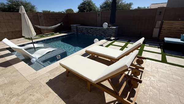 New BYO Pool Build Sheer Descent - These customers selected our build-your-own pool package and saved thousands of dollars turning their backyard into the one from their vision.