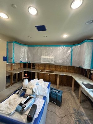 Water Damage in Lake Elsinore , CA - ServiceFirst Restoration responded to a water loss in Lake Elsinore, CA, caused by a hot water PEX line leak under the kitchen sink. Following inspection and asbestos testing (non-detect), remediation began with containment setup, removal of affected cabinets, drywall, and hardwood flooring, and thorough HEPA cleaning and sanitization. Clearance testing confirmed all areas passed. A change order was approved for additional flooring removal, and all demo and remediation work was completed by August 29, 2025. Communication was maintained with the homeowner and referral partner, confirming payment receipts and invoicing. The homeowner mailed the remaining balance, and final invoices were sent. The job was completed successfully, and ServiceFirst thanked the referral partner for their continued trust and collaboration.
