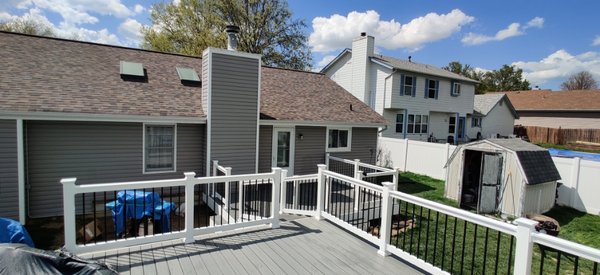 Sea salt grey with white accents - This property was in desperate need of an uplift. The previous deck was rotted and quickly becoming unsafe for the customer and their family without them knowing. With Timbertech's leading technology we installed something that is not only beautiful but built to withstand the ever-changing weather here in Missouri and remain safe for their family.