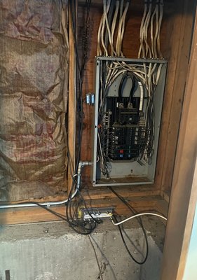 Panel Replacement - The old electrical panel was in bad shape, & there was no room to add an air conditioning circuit. Panel Replacement - The old electrical panel was in bad shape, & there was no room to add an air conditioning circuit.