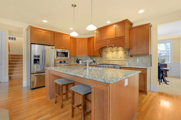 SOLD | Renton Highlands - Sold in 5 days over asking price with multiple offers!
Located in the Renton Highlands, this sprawling 3,320 square foot home boasts stylish custom finishes, rich hardwood flooring, and vaulted ceilings. The large formal living and dining rooms flow into an open concept kitchen with island, slab granite counters & stainless steel appliances- perfect for entertaining. The master suite features a spa-like ensuite & walk-in closet, upstairs laundry with 3 additional bedrooms & main floor den. Fully fenced backyard with entertaining deck and 3-car garage. Close proximity to Hazen High School, 405/I-90 and the Renton Landing. SOLD | Renton Highlands - Sold in 5 days over asking price with multiple offers!
Located in the Renton Highlands, this sprawling 3,320 square foot home boasts stylish custom finishes, rich hardwood flooring, and vaulted ceilings. The large formal living and dining rooms flow into an open concept kitchen with island, slab granite counters & stainless steel appliances- perfect for entertaining. The master suite features a spa-like ensuite & walk-in closet, upstairs laundry with 3 additional bedrooms & main floor den. Fully fenced backyard with entertaining deck and 3-car garage. Close proximity to Hazen High School, 405/I-90 and the Renton Landing.