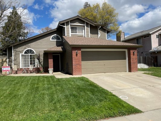 Exterior Stucco/Siding painting - We went through the process of power washing, caulking, and prep that had to be done. These two images are the finished product which came beautiful, with the settle olive green and the white trim.