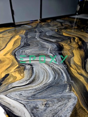 Black, gold, and silver metallic epoxy floor. - Black, gold, and silver metallic epoxy floor. Black, gold, and silver metallic epoxy floor. - Black, gold, and silver metallic epoxy floor.