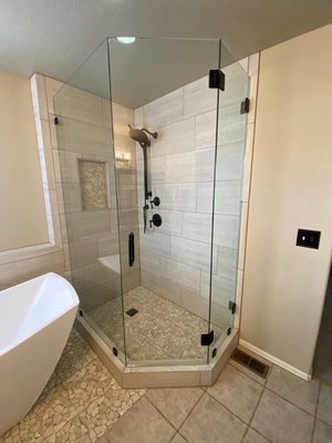 Curved / Bent Showers & Enclosures - For Denver homeowners who want more than flat glass, GCS Glass & Mirror crafts custom curved and bent glass shower enclosures. Shaped through a precise thermal process from ANSI-certified tempered glass, our round-corner stalls, quarter-round enclosures, and bowed bypass doors soften hard lines and open up the room. Curved glass is ideal for tight corners or as a showpiece in larger Castle Pines and Greenwood Village baths. Choose clear, low-iron, frosted, or textured glass with chrome, brushed nickel, matte black, or oil-rubbed bronze hardware, all measured, fabricated, and installed by our local crew. Curved / Bent Showers & Enclosures - For Denver homeowners who want more than flat glass, GCS Glass & Mirror crafts custom curved and bent glass shower enclosures. Shaped through a precise thermal process from ANSI-certified tempered glass, our round-corner stalls, quarter-round enclosures, and bowed bypass doors soften hard lines and open up the room. Curved glass is ideal for tight corners or as a showpiece in larger Castle Pines and Greenwood Village baths. Choose clear, low-iron, frosted, or textured glass with chrome, brushed nickel, matte black, or oil-rubbed bronze hardware, all measured, fabricated, and installed by our local crew.