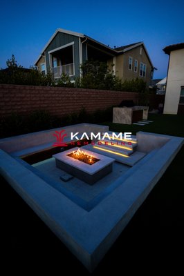 Sunken Firepit, Family Room and Outdoor Kitchen - Orange County - How do you take an 1,800 sqft backyard that only has grass and turn it into the best backyard in the neighborhood? Our designers, project managers, and field crews have the answer.
How about a sunken fire pit area, an outdoor kitchen with custom countertops and waterfalls, plus a sauna deck and a wood-based family room? Sunken Firepit, Family Room and Outdoor Kitchen - Orange County - How do you take an 1,800 sqft backyard that only has grass and turn it into the best backyard in the neighborhood? Our designers, project managers, and field crews have the answer.
How about a sunken fire pit area, an outdoor kitchen with custom countertops and waterfalls, plus a sauna deck and a wood-based family room?