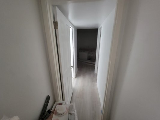 House Renovation - We did a level 5 smooth in the master bedroom 2xbathroom and closet. As well as orange peel in the kitchen and guest bedroom. 1 coat of primer and 2 coats of color. What a transformation!